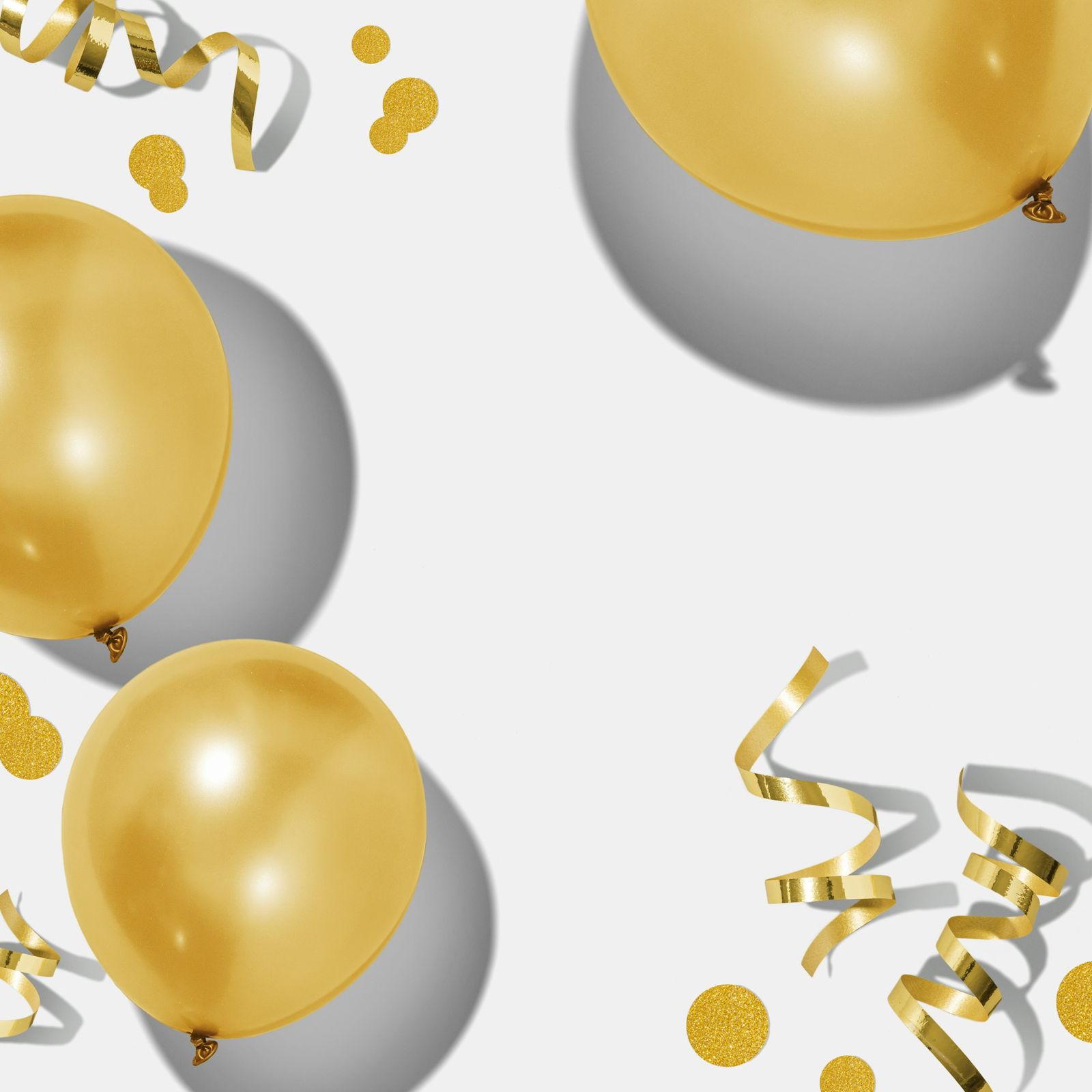 Gold balloons and streamers for a celebration
